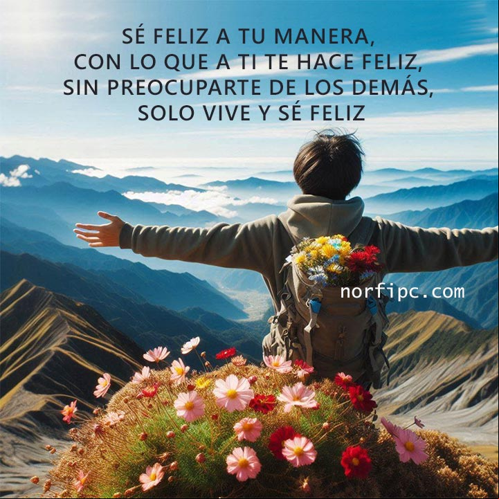 Persona con los brazos abiertos en la cima de una montaña